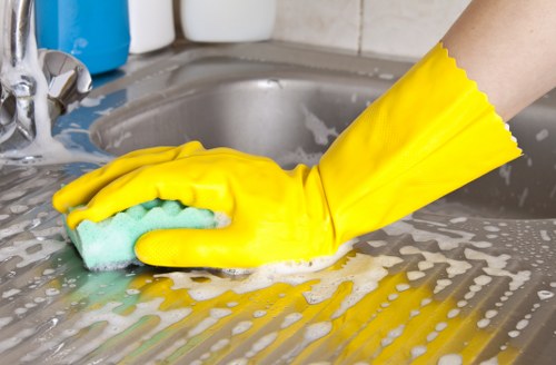Professional cleaner maintaining communal areas in Brompton